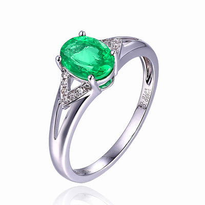 Solitaire Oval Emerald Ring with Trio Diamond Accents